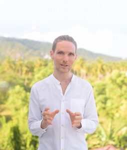 Dima, yoga teacher at Yoga Nisarga, photographed outdoors