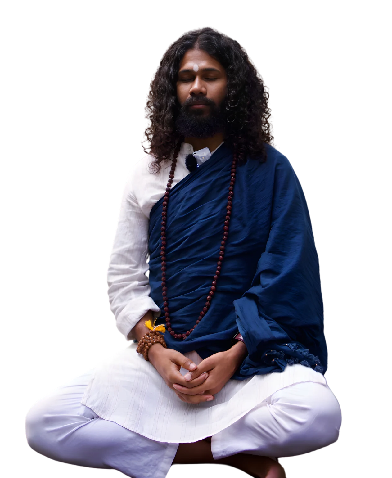 Swami Hari (Swami Chaittanya Hari), founder of Yoga Nisarga, seated in meditation with mala beads
